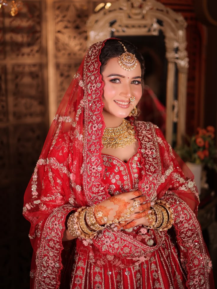 Classic red lehenga bridal look in Lucknow — full bridal transformation AAINA Salon